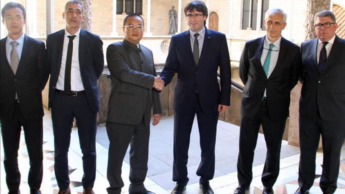 Chen y su Consejo, con Carles Puigdemont