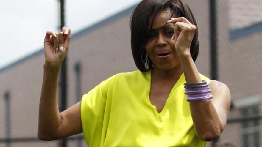 Michelle Obama dice que está en mejor forma que su marido