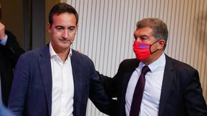 Reverter y Laporta, durante una de sus comparecencias