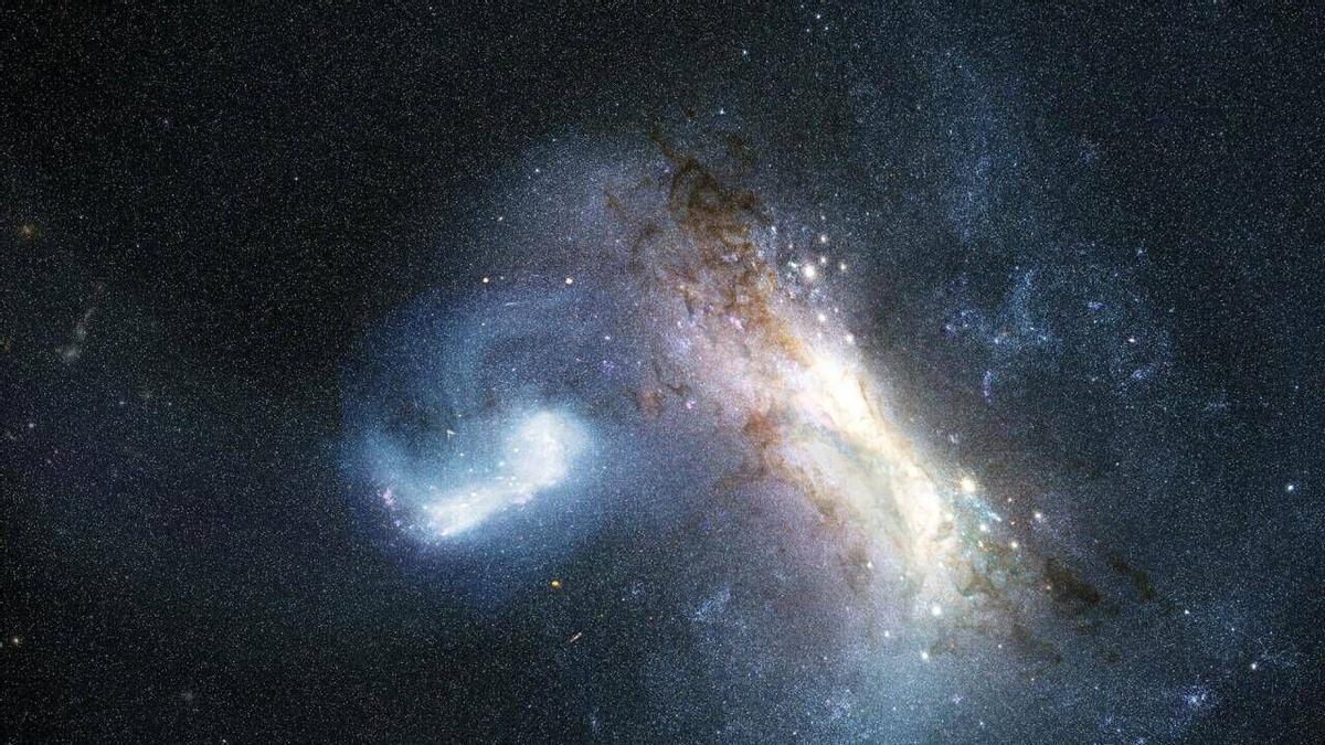 Representación artística de la colisión entre una galaxia enana conocida como LKH (izquierda) y una Vía Láctea joven (derecha), hace unos 12.000 millones de años