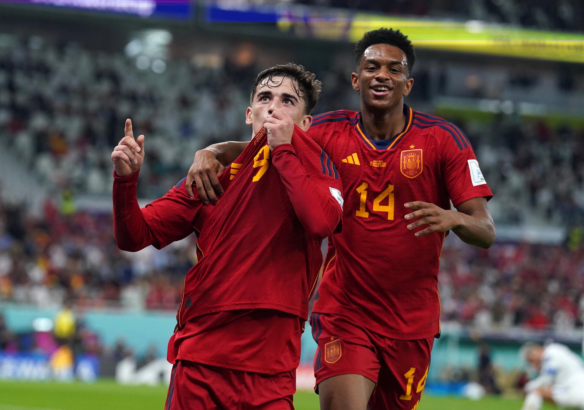 23 November 2022, Qatar, Doha: Spain's Gavi celebrates scoring his side's fifth goal with team-mate Jose Gaya during during the FIFA World Cup Qatar 2022 Group E soccer match between Spain and Costa Rica at the Al Thumama Stadium. Photo: Adam Davy/PA Wire