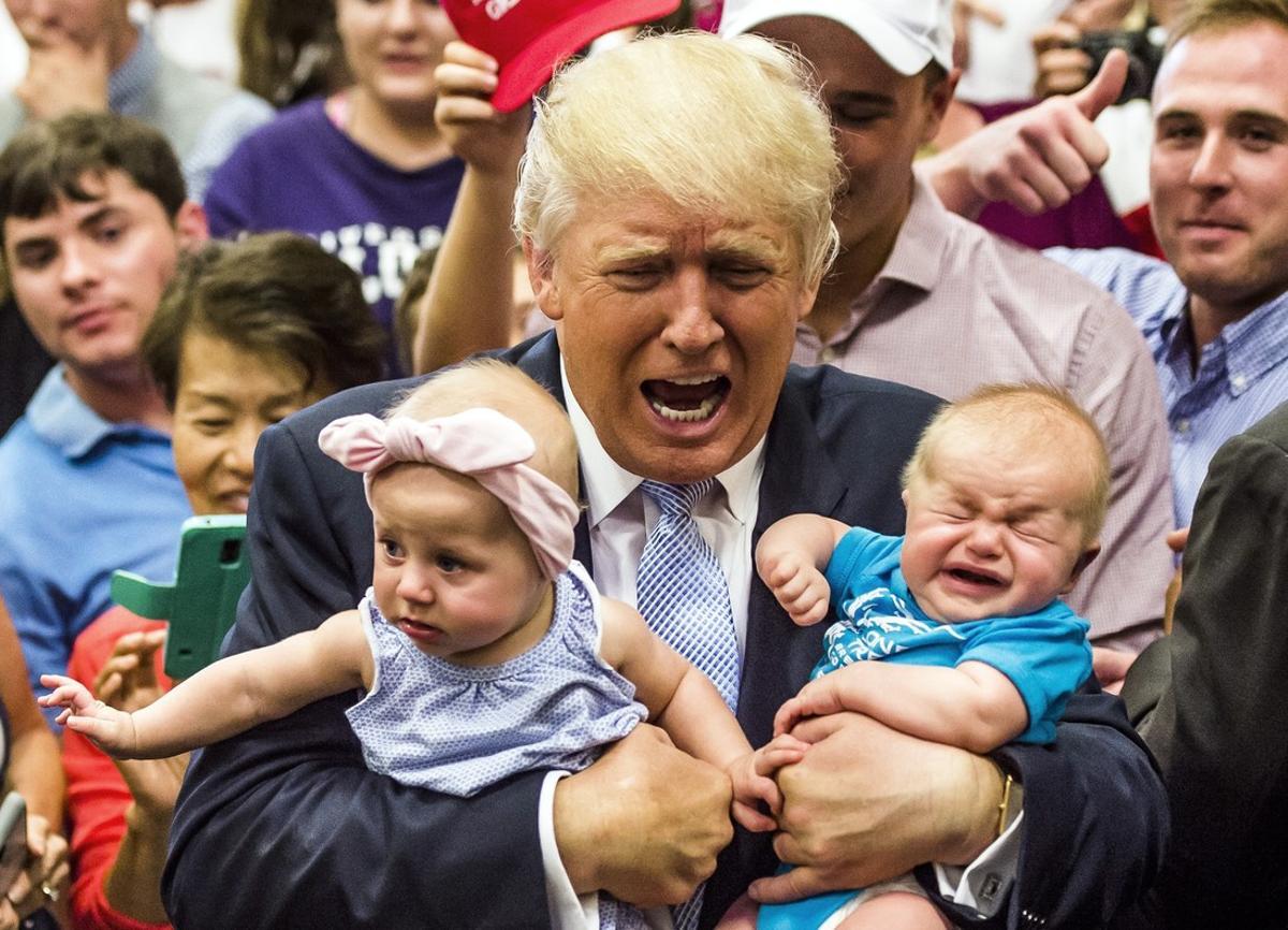 Republican presidential candidate Donald Trump holds baby cousins Evelyn Kate Keane, 6 months old, and Kellen Campbell, 3 months old, following his speech Friday, July 29, 2016, in Colorado Springs, Colo. (Stacie Scott/The Gazette via AP) Republican presidential candidate Donald Trump holds baby cousins Evelyn Kate Keane, 6 months old, and Kellen Campbell, 3 months old, following his speech Friday, July 29, 2016, in Colorado Springs, Colo. (Stacie Scott/The Gazette via AP)