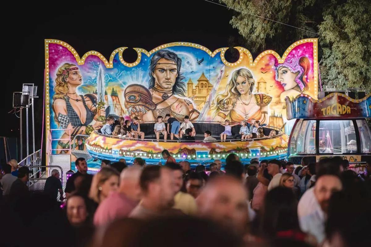 Imagen de archivo del ambiente en la zona de atracciones del recinto ferial de Mérida.