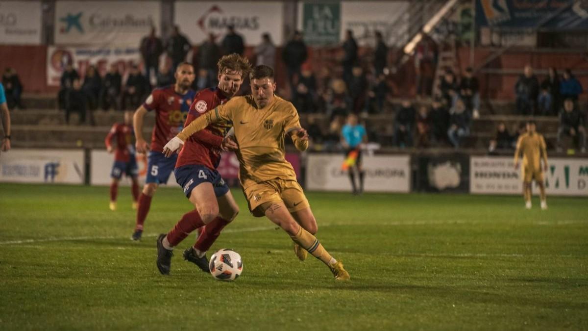 Ot Serrano y Antonio Aranda en el partido amistoso entre Olot y Barça Atlètic