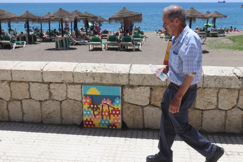 Daños en tres de los mosaicos de Invader en Málaga.