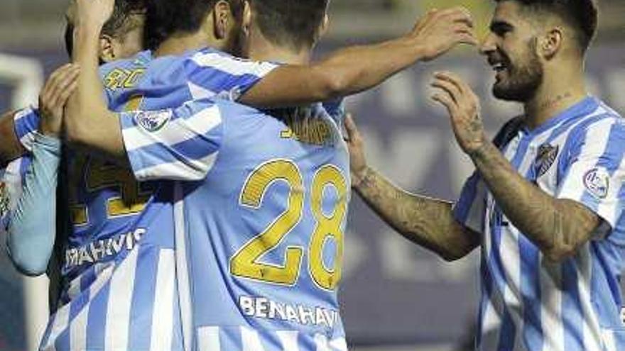 Los jugadores del Málaga CF celebran un gol durante el presente campeonato.