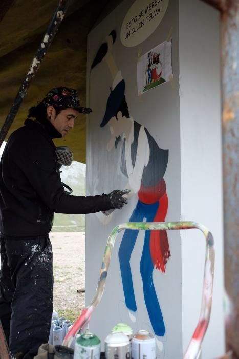 Trabajo de pintura en el monolito de la cima Angli