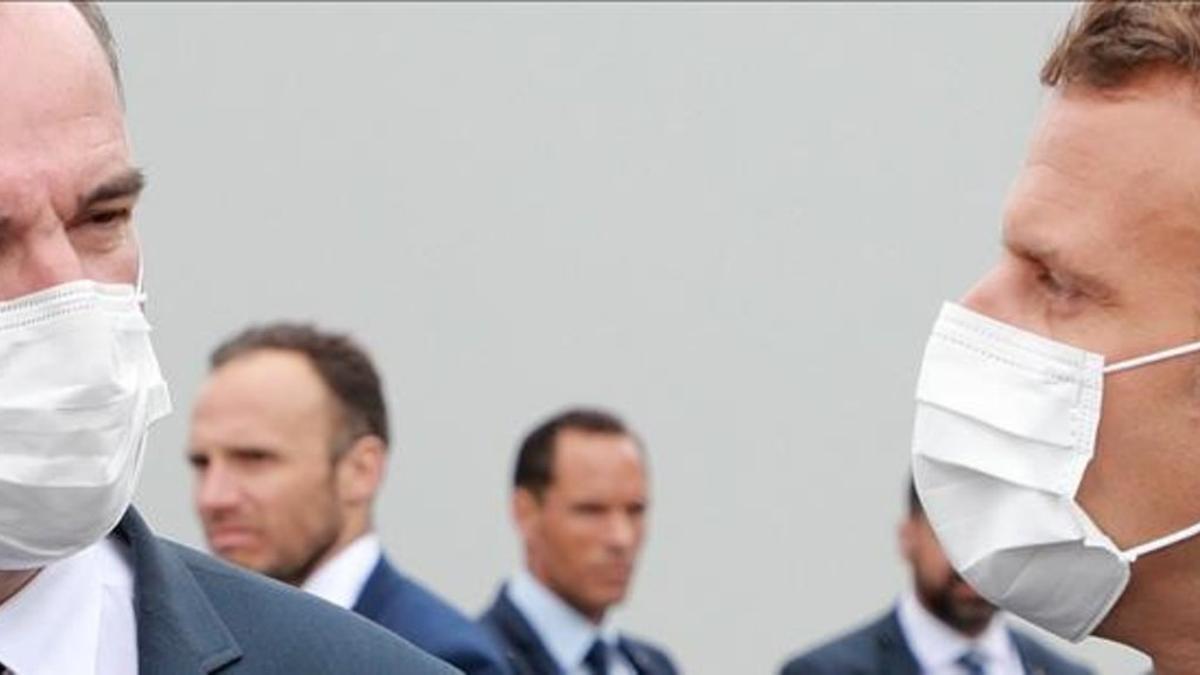 El presidente francés, Emmanuel Macron (derecha) y el primer ministro Jean Castex.