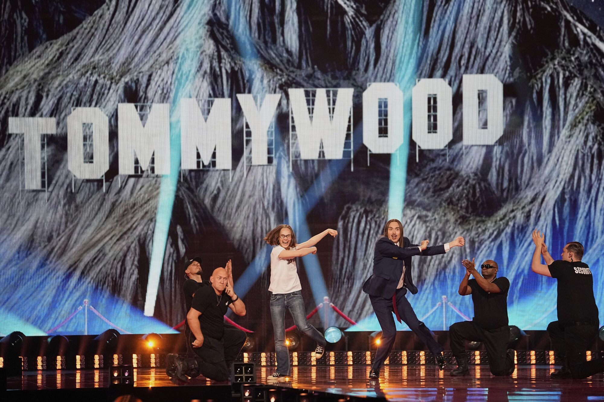 Tommy Cash from Estonia, center, performs the song "Espresso Macchiato" during the Grand Final of the 69th Eurovision Song Contest, in Basel, Switzerland, Saturday, May 17, 2025. (AP Photo/Martin Meissner)