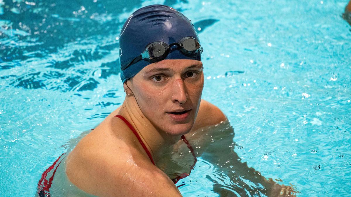 In this file photo taken on January 22, 2022, US swimmer Lia Thomas, a transgender woman, finishes the 200-yard Freestyle for the University of Pennsylvania at an Ivy League swim meet against Harvard University in Cambridge, Massachusetts. - Thomas' controversial career as a transgender swimmer hung in the balance on February 2, 2022, after the collegiate body governing the sport announced new rules that could impact her ability to race competitively. USA Swimming said it created a new set of guidelines at the elite level for transgender athlete participation that &quot;relies on science and medical evidence-based methods to provide a level-playing field for elite cisgender women, and to mitigate the advantages associated with male puberty and physiology.&quot; (Photo by Joseph Prezioso / AFP)