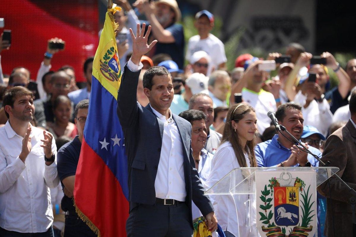 Venezuelan opposition leader and self-proclaimed interim president Juan Guaido waves to supporters during a rally against Venezuelan President Nicolas Maduro s government in Caracas  Venezuela February 2  2019  REUTERS Andres Martinez Casares