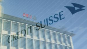 Logos of Swiss banks UBS and Credit Suisse are seen in Zurich