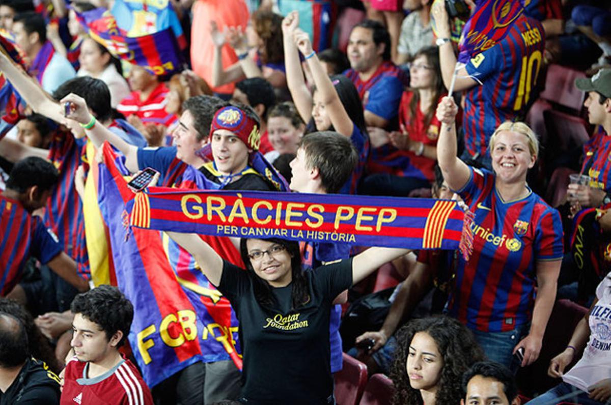 Seguidors del Barça, durant la festa que el club va organitzar al Camp Nou per celebrar la victòria en la final de la Copa del Rei aconseguida contra l’Athletic de Bilbao. Aquest ha estat l’últim títol aconseguit per Pep Guardiola en els quatre anys que ha estat l’entrenador de l’equip blaugrana.