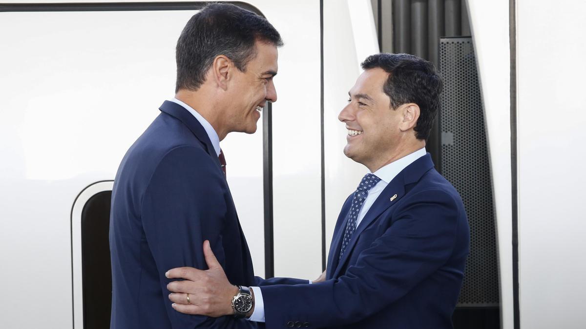 Pedro Sánchez y Juanma Moreno.