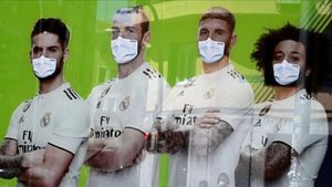 rozas53306908 a gambling hall s advertising poster depicting isco  gareth 200503232811