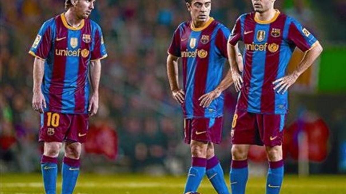 TRES GENIOS Messi, Xavi e Iniesta.