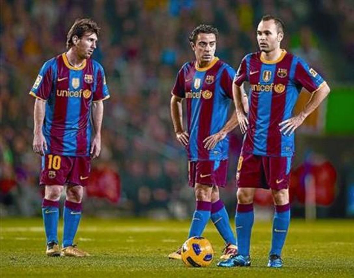 TRES GENIS Messi, Xavi i Iniesta. TRES GENIS Messi, Xavi i Iniesta.