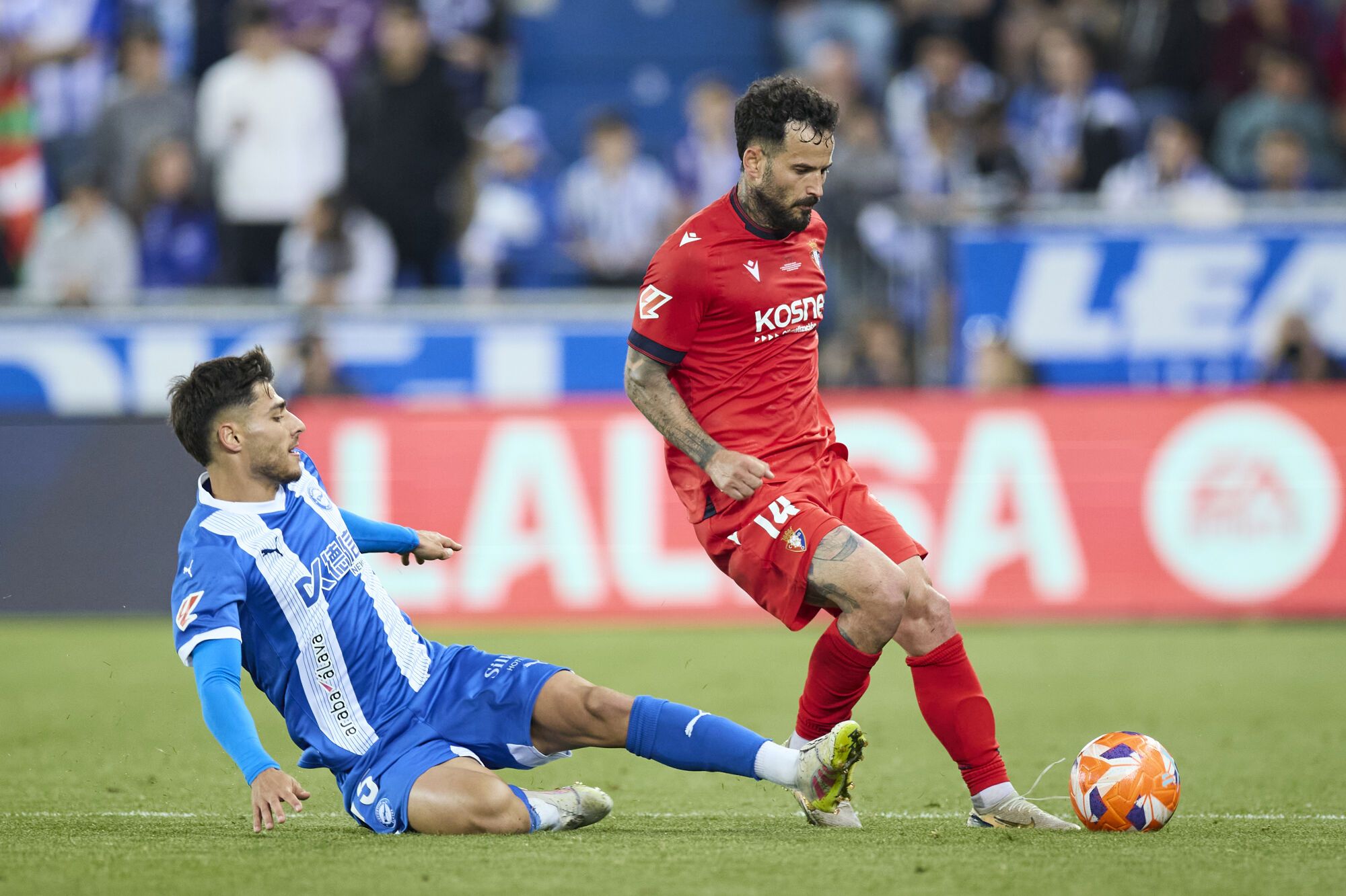 Carlos Martin of Deportivo Alaves competes for the ball with Ruben Garcia of CA Osasuna during the LaLiga EA Sports match between Deportivo Alaves and CA Osasuna at Mendizorrotza on May 24, 2025, in Vitoria, Spain. AFP7 24/05/2025 ONLY FOR USE IN SPAIN. Ricardo Larreina / AFP7 / Europa Press;2025;SPAIN;SPORT;ZSPORT;SOCCER;ZSOCCER;Deportivo Alaves v CA Osasuna - LaLiga EA Sports;