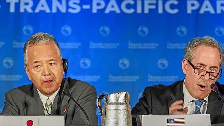 El ministre japonès Akira Amari i el representant de Comerç d&#039;EUA, Michael Froman