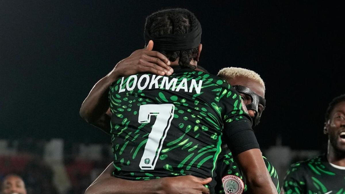 Nigeria's Victor Osimhen, center, celebrates with Nigeria's Ademola Lookman, front, after scoring his side's third goal during the Africa Cup of Nations round of 16 soccer match between Nigeria and Mozambique in Fez, Morocco, Monday, Jan. 5, 2026. (AP Photo/Themba Hadebe) Associated Press / LaPresse Only italy and spain