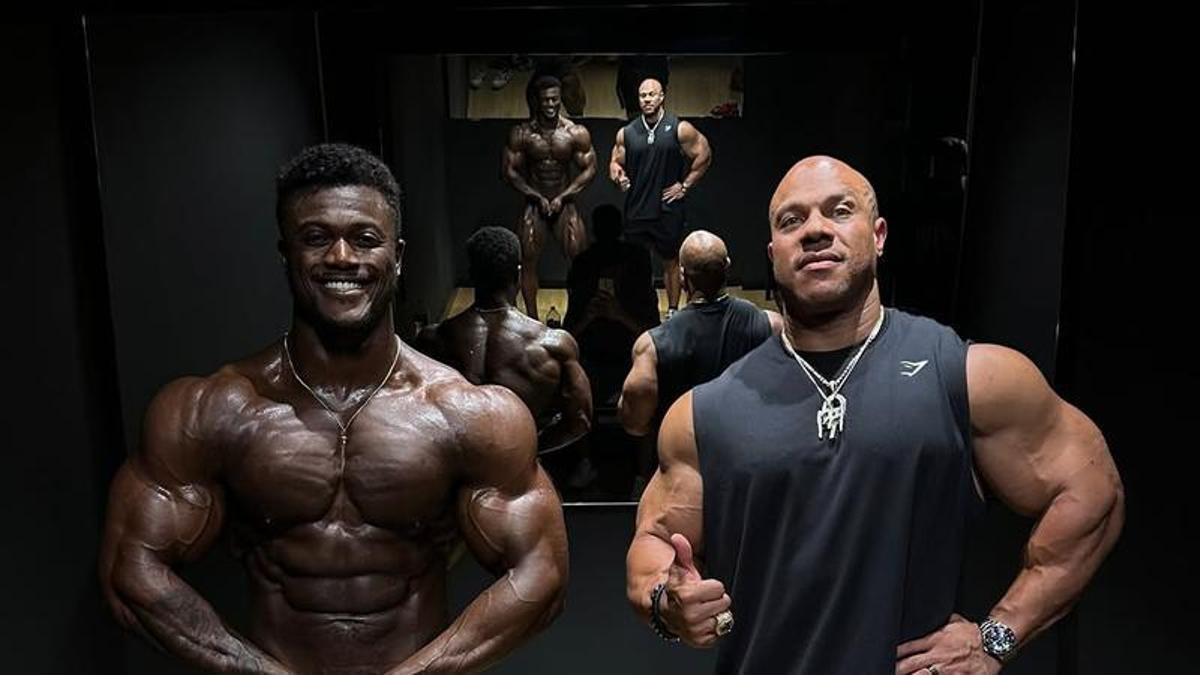 Denis Rose junto con Phil Heath