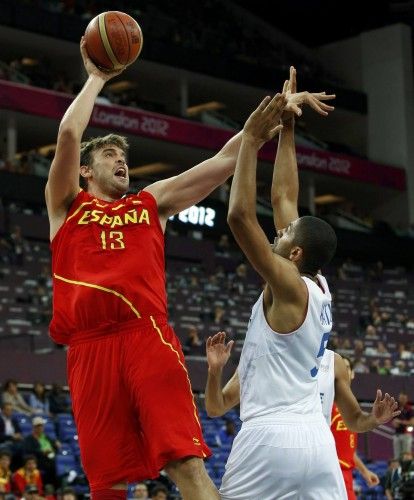 Spain's Gasol shoots over France's Batum during their men's quarterfinal basketball match at the North Greenwich Arena in London during the London 2012 Olympic Games