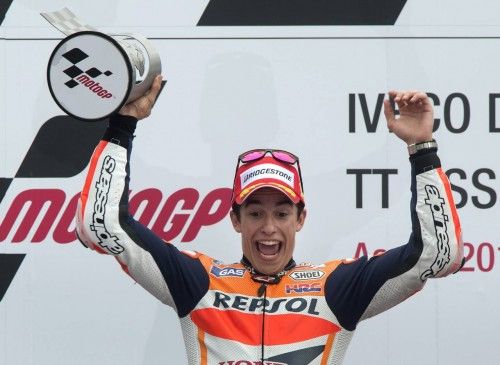 Honda MotoGP rider Marc Marquez of Spain celebrates on the podium after winning the Dutch Grand Prix in Assen