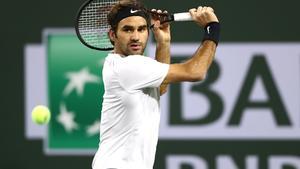 INDIAN WELLS, CA - MARCH 15: Roger Federer of Switzerland returns a shot to Hyeon Chung of Korea during of the BNP Paribas Open at the Indian Wells Tennis Garden on March 15, 2018 in Indian Wells, California.   Matthew Stockman/Getty Images/AFP