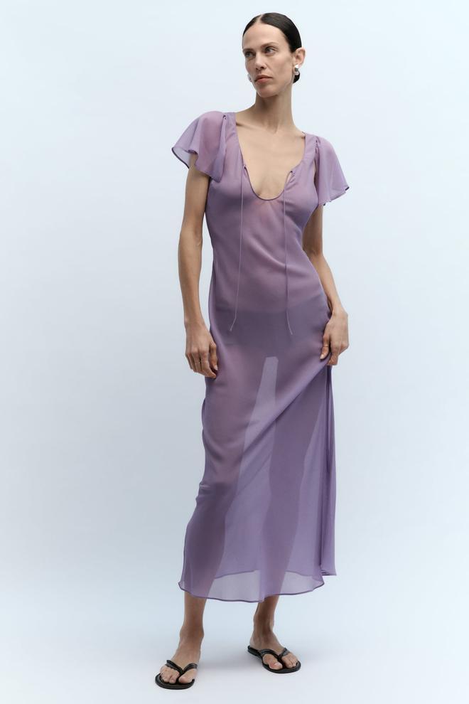 Vestido de fiesta semitransparente con lazadas y tono lila de Zara