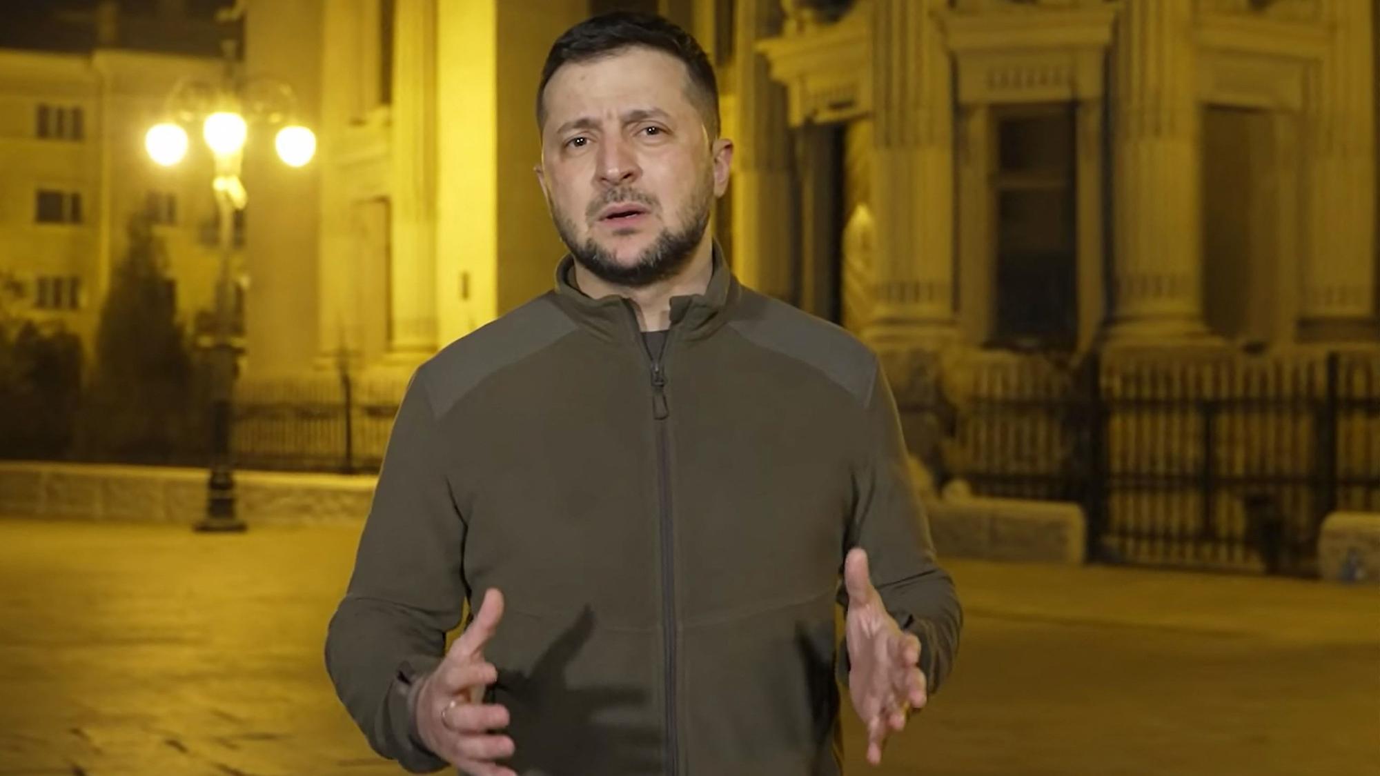 In this handout video grab taken from a footage released by the Ukrainian Presidency early on March 19, 2022, Ukrainian President Volodymyr Zelensky delivers a video address in Ukraine. - Ukrainian President Volodymyr Zelensky urges Moscow that it is "time" to discuss and "restore territorial integrity and justice for Ukraine," adding that the Russian invasion in his country is "a war crime". (Photo by Handout / UKRAINIAN PRESIDENTIAL PRESS SERVICE / AFP) /