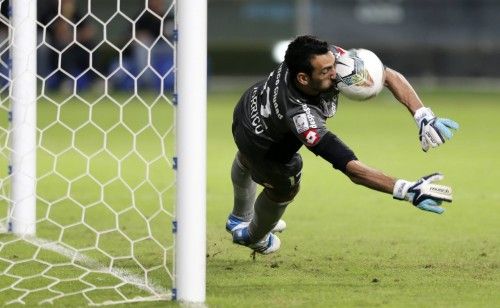 Torrico of Argentina's San Lorenzo saves a penalty kick in a penalty shootout during their Copa Libertadores soccer match against Brazil's Gremio in Porto Alegre