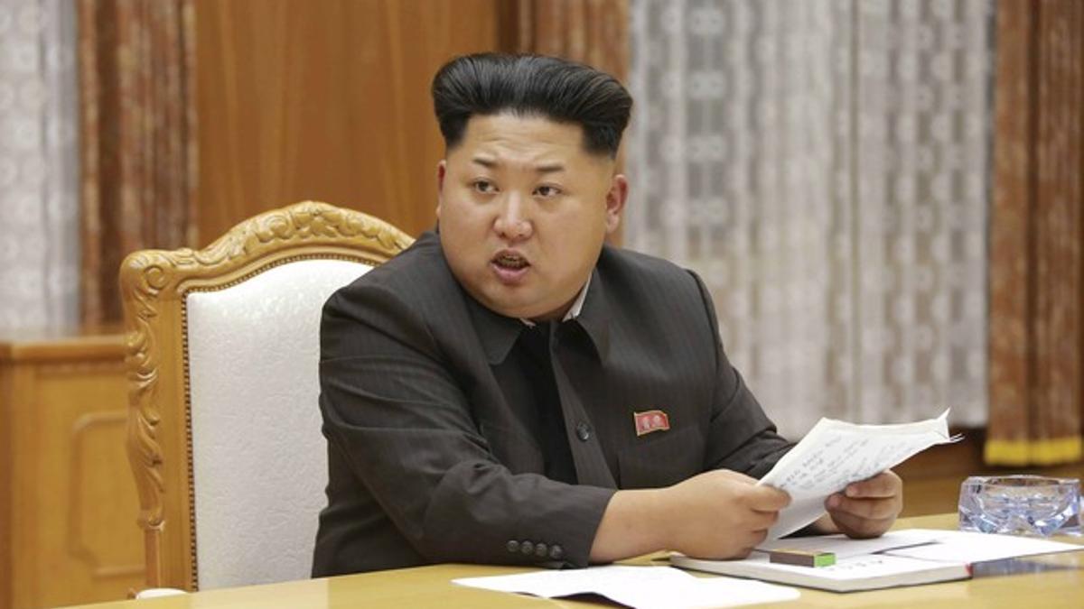 KCNA picture shows North Korean leader Kim Jong Un speaking at an emergency meeting of the Workers' Party of Korea Central Military Commission