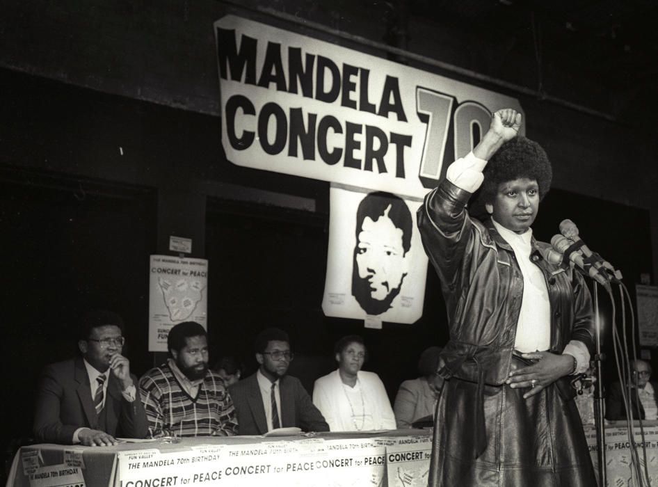 FILE PHOTO: Winnie Mandela raises her fist after ...