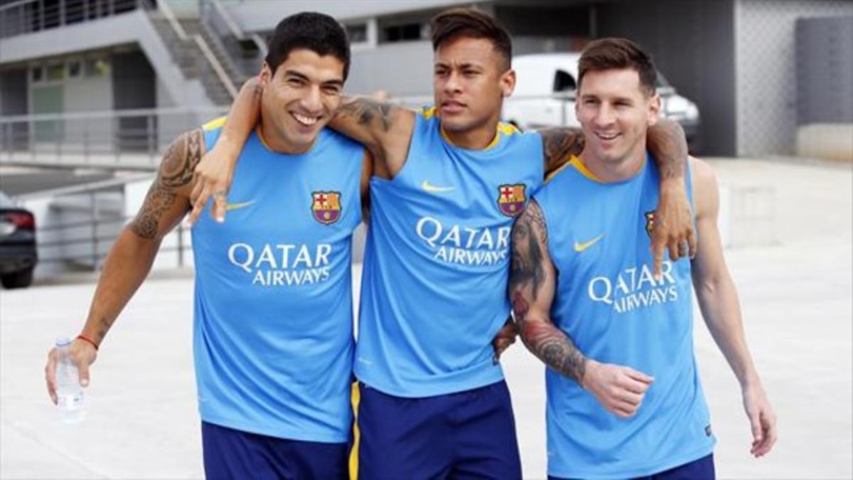 Suárez, Neymar y Messi, ayer, antesde iniciar el entrenamiento.