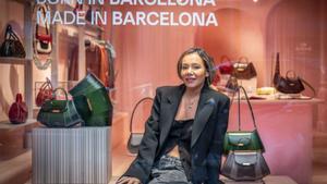 Comprar-se una bossa de mà, "símbol de poder"