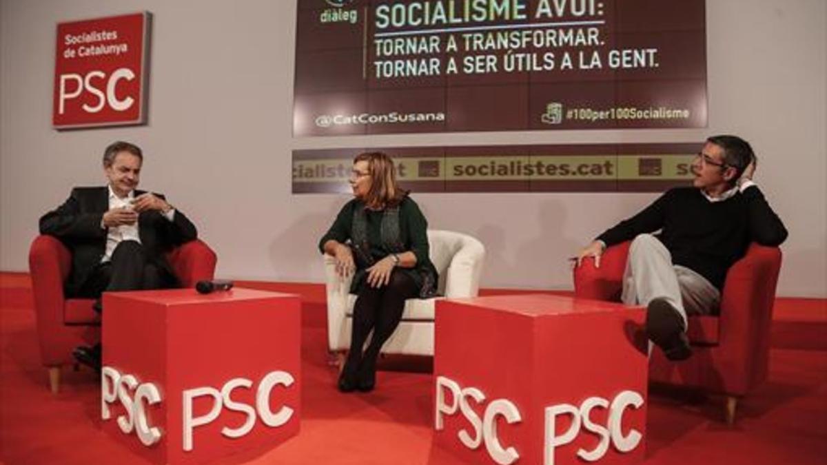 José Luis Rodríguez Zapatero y Eduardo Madina, ayer, en una charla con militantes en la sede del PSC.
