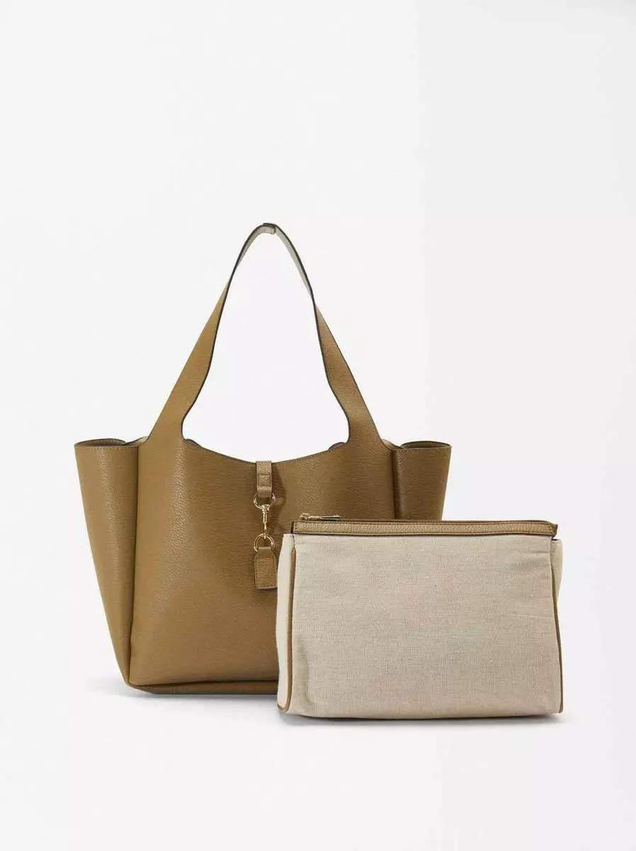 Camina con estilo: 5 bolsos shopper de Parfois, tu compañero perfecto 6 Moncloa Organización y estilo universitario en un solo bolso shopper con neceser de Parfois