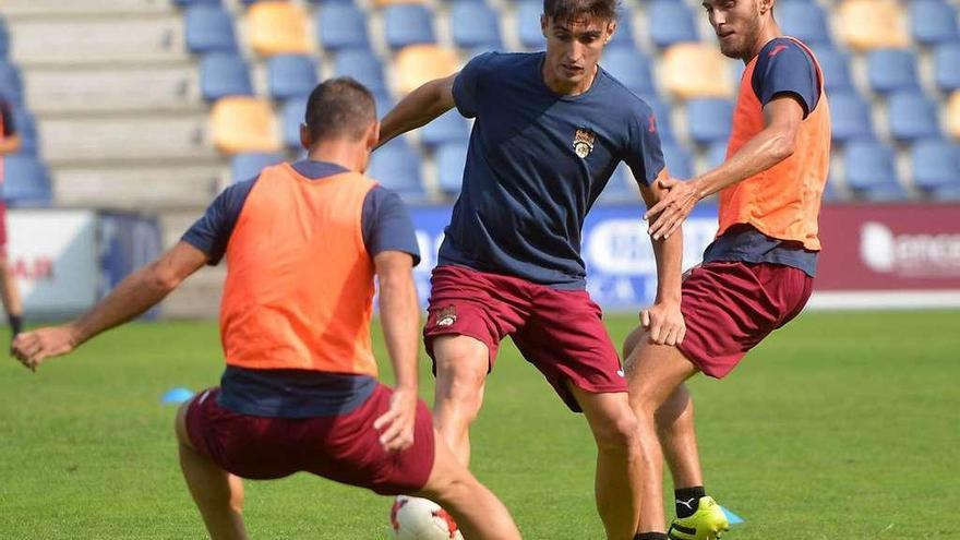 Berrocal, Bruno y Añón durante un entrenamiento en Pasarón. // G. Santos