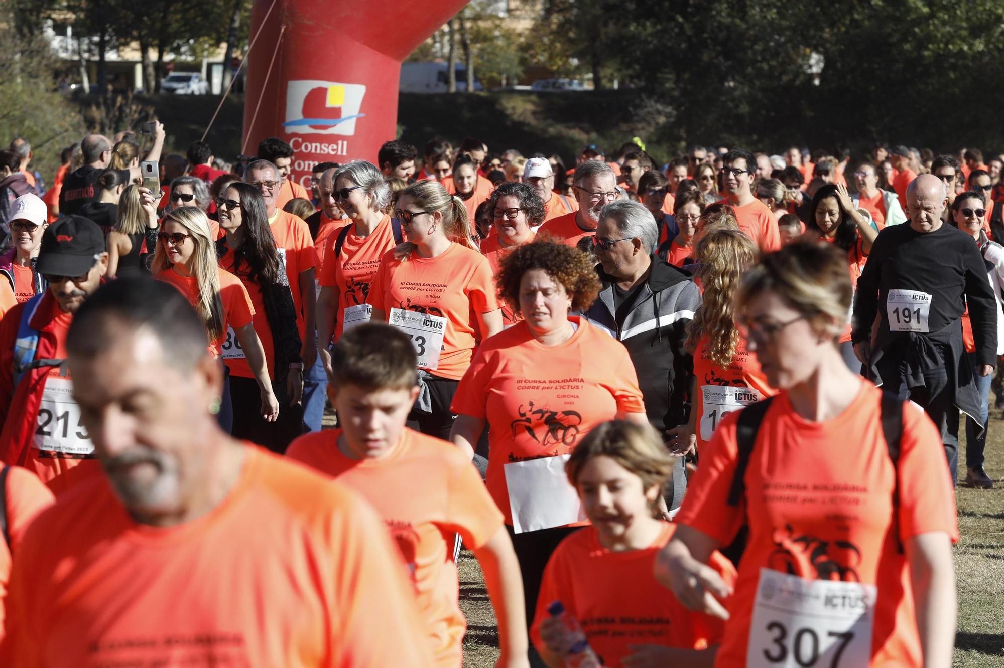 Imatges de la cursa solidària per l'ictus a Girona