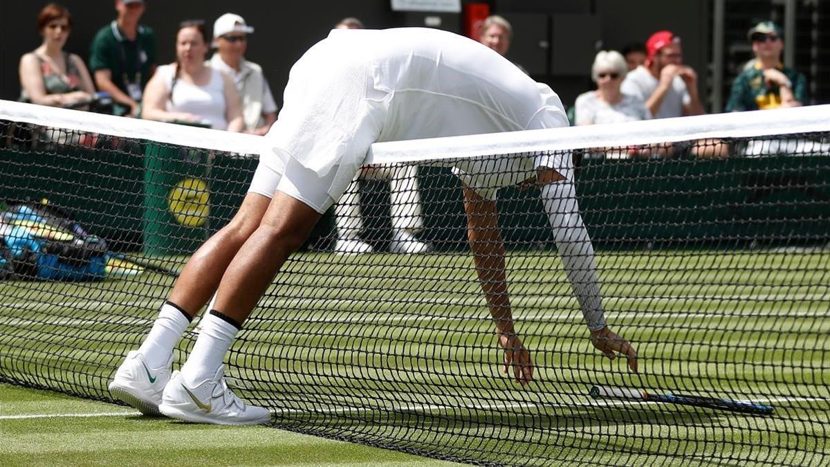 marcosl48901586 topshot   australia s nick kyrgios bends over the net during190703180700