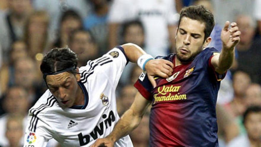 Özil y Alba, en la pasada Supercopa de España.