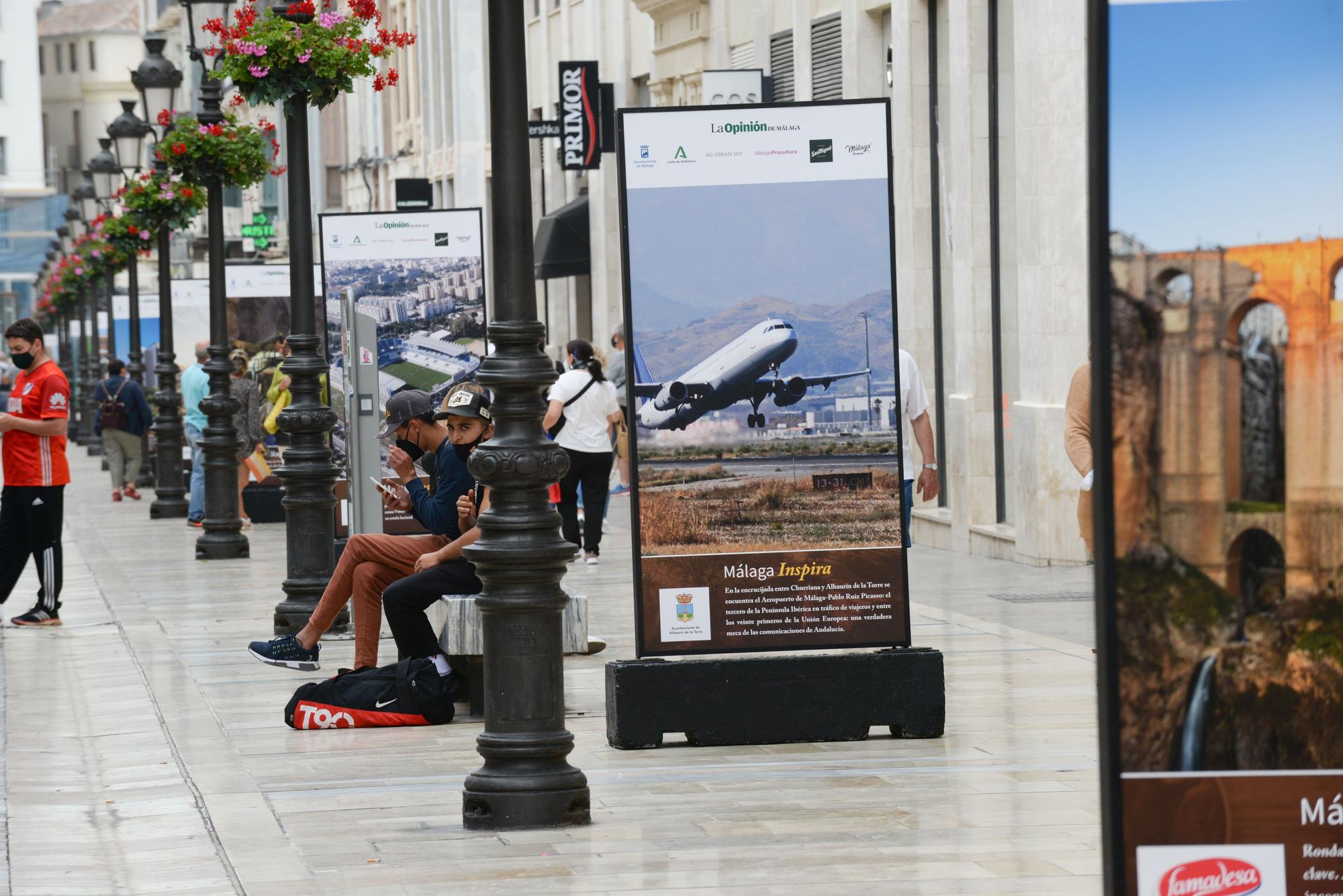 Exposición fotográfica 'Málaga Inspira', en la calle Larios