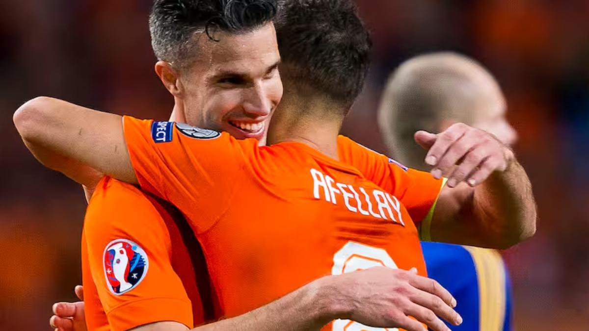 Van Persie y Afellay, juntos en la selección de Holanda durante su etapa de futbolistas