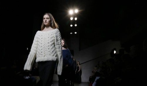 Models present creations by designer Delouis and creative director Mannerheim as part of their Autumn/Winter 2015/2016 women's ready-to-wear collection for Each x Other during Paris