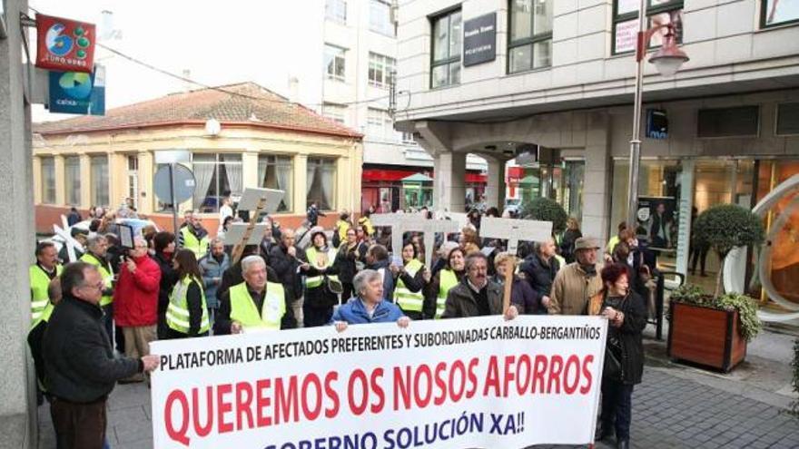 El fondo de rescate aplaza la quita y el canje de preferentes al próximo año