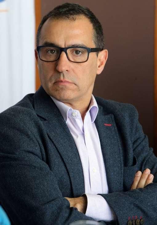 César S. Ballesteros.