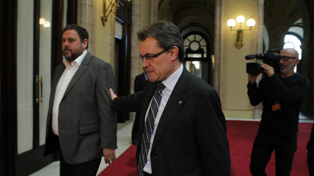 El presidente de la Generalitat, Artur Mas, y el líder de ERC, Oriol Junqueras.