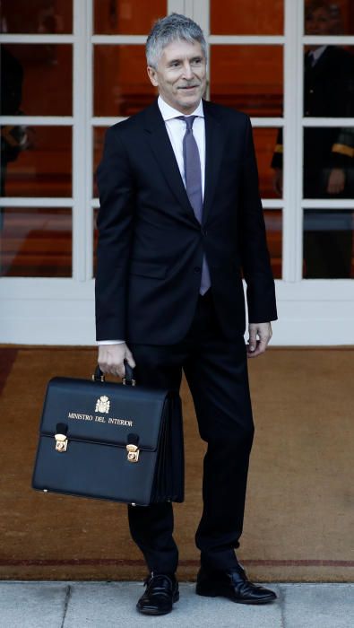 Spain's Prime Minister Pedro Sanchez holds his ...