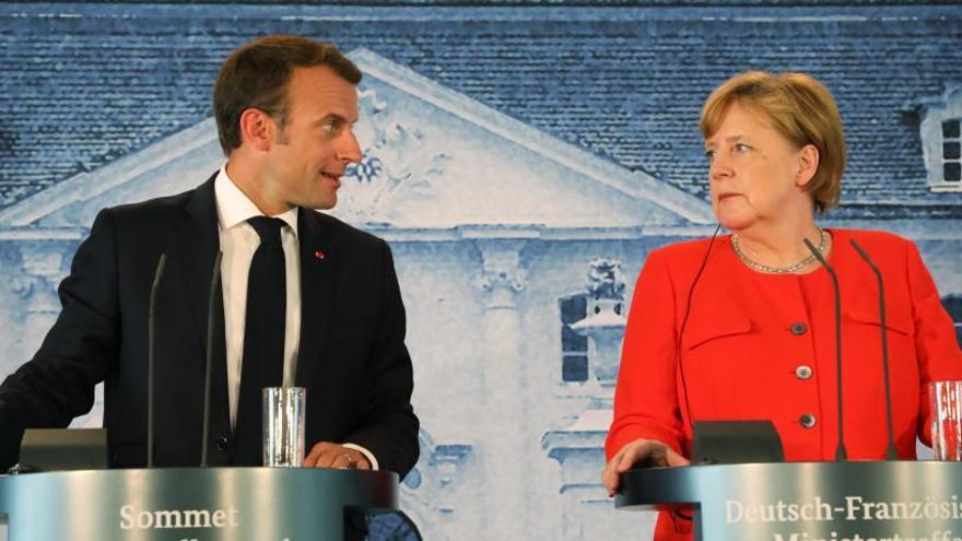 Merkel y Macron durante la comparecencia conjunta que han hecho