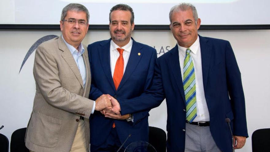 Marco Aurelio Pérez, Rafael Robaina (centro) y Carlos Estévez.